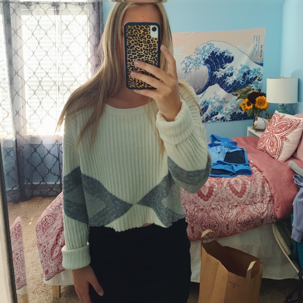 Woman’s cropped Calvin Klein sweater